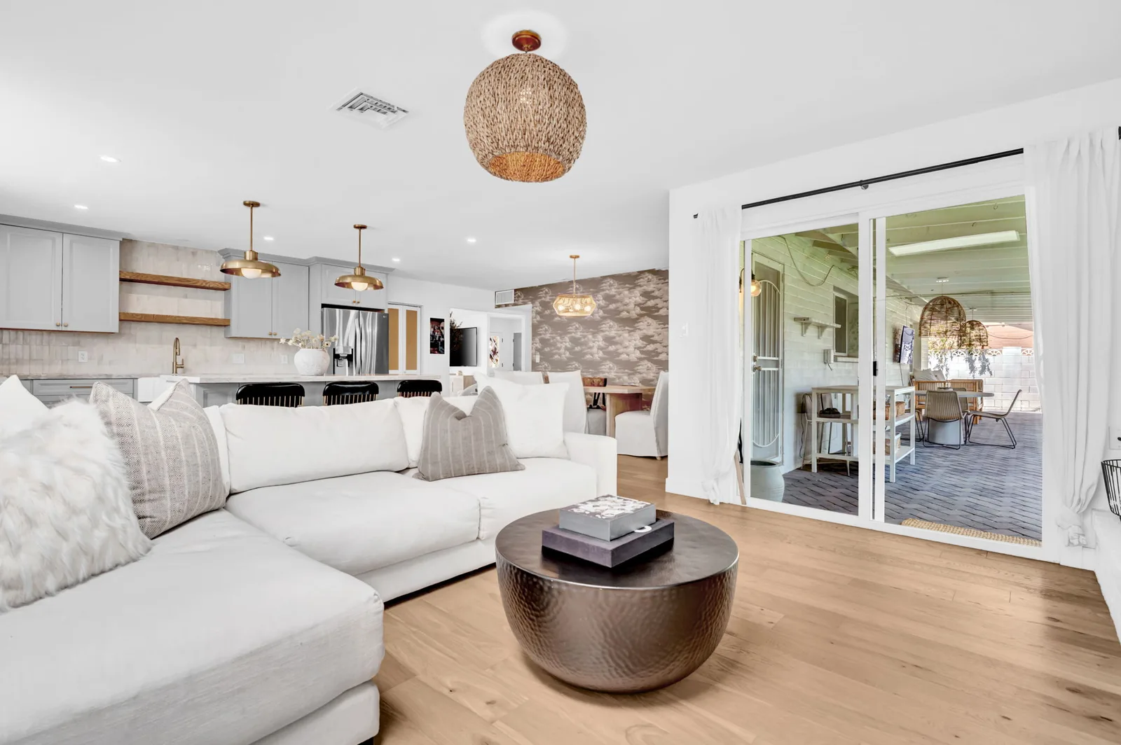 Great room open to the kitchen with sliding doors to the patio.