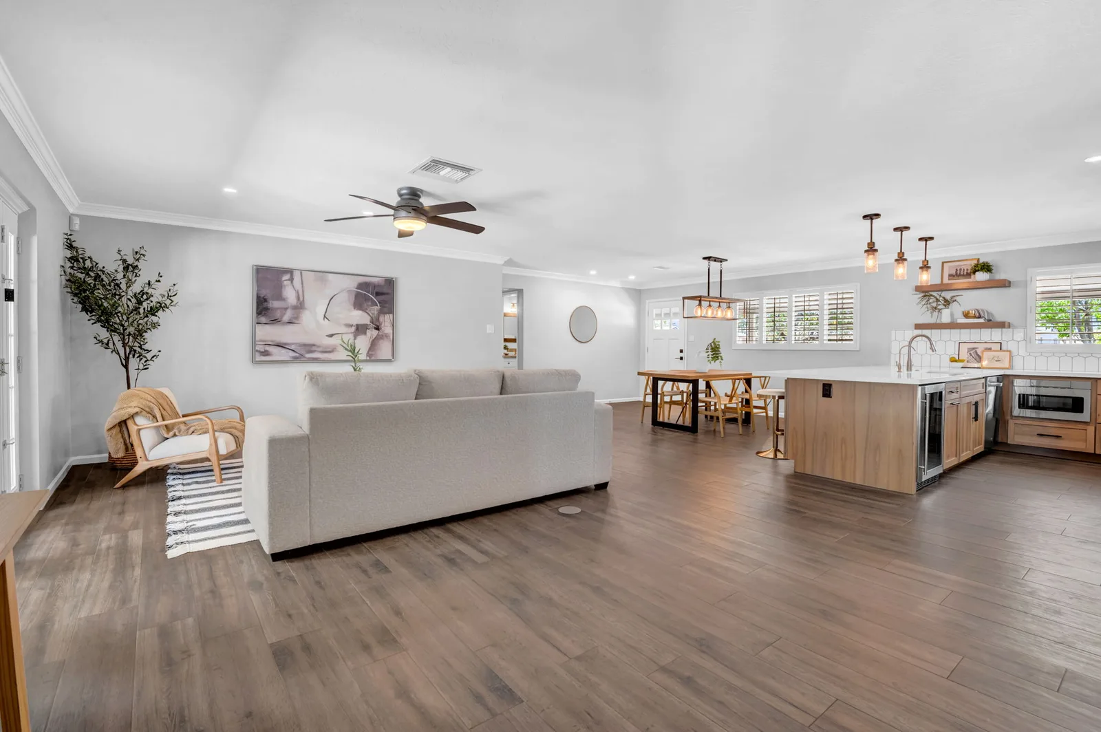 Great room looking through to the kitchen island and dining area.